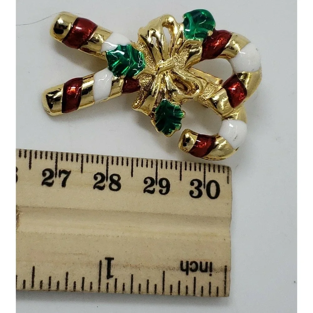 gold tone candy canes with bow and holly Christmas brooch pin‎